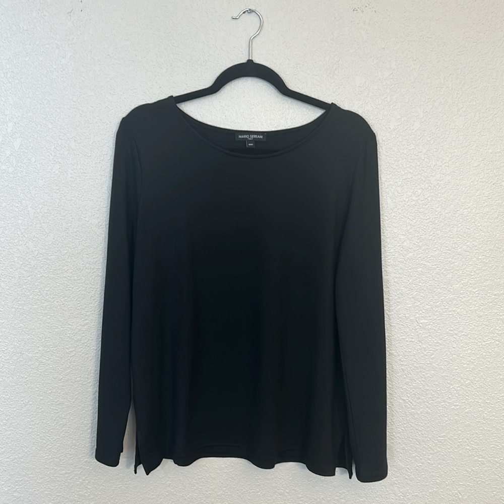Women’s long sleeve black top size medium.